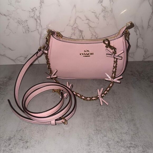 Coach Handbags - Coach Pink Teri Mini Crossbody Bag With Bows